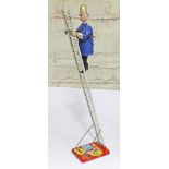 A Marx tinplate Trumpton Town Fire Brigade mechanical man on ladder. CONDITION REPORT - good,