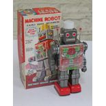 A 1960s Japanese Horikawa tin plate electric robot with box. CONDITION REPORT - bad battery