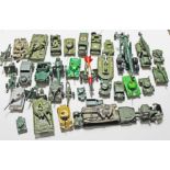 36 military diecast vehicles/guns to include Britains, Dinky and Matchbox.