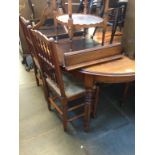 OAK EXTENDING DINING TABLE AND FOUR SPINDLE BACK RUSH SEATED CHAIRS