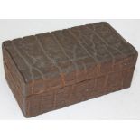 A wooden faux crocodile effect box, length 22cm.