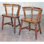 A pair of children's elm seated chairs, one stamped 'BAC 880', width 37.5cm, depth 26cm & height