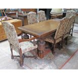 An Elizabethan style oak drawer leaf table with six chairs floral upholstered chairs, minimum