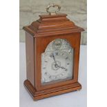 An Elliot Mappin & Webb clock no442, height 28cm.