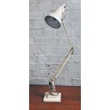 A Herbert & Sons cream anglepoise lamp.