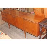 A McIntosh 1970s teak sideboard, length 205cm, depth 45cm & height 75.5cm.