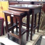 A NEST OF MAHOGANY TABLES H50CM W45CM D35CM