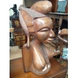 A CARVED AFRICAN BUST 50CM