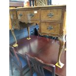 A 1930S BURR WALNUT WRITING DESK