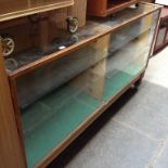 A GLASS SHOP DISPLAY CABINET