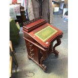 A REPRODUCTION MAHOGANY DAVENPORT DESK