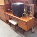 A DRESSING TABLE AND STOOL