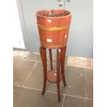 BRASS BOUND PLANT BUCKET ON STAND. BY LISTER H106CM