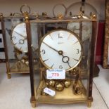 THREE CLOCKS WITH BRASS AND GLASS CASES J4