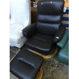 A BLACK LEATHER RECLINING SWIVEL CHAIR WITH STOOL