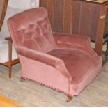 A Victorian upholstered lounge chair in the manner of Howard & Sons, width 86cm, depth 96cm & height