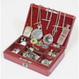 A jewellery box and contents to include a silver Albert chain, a silver vesta, five watches,