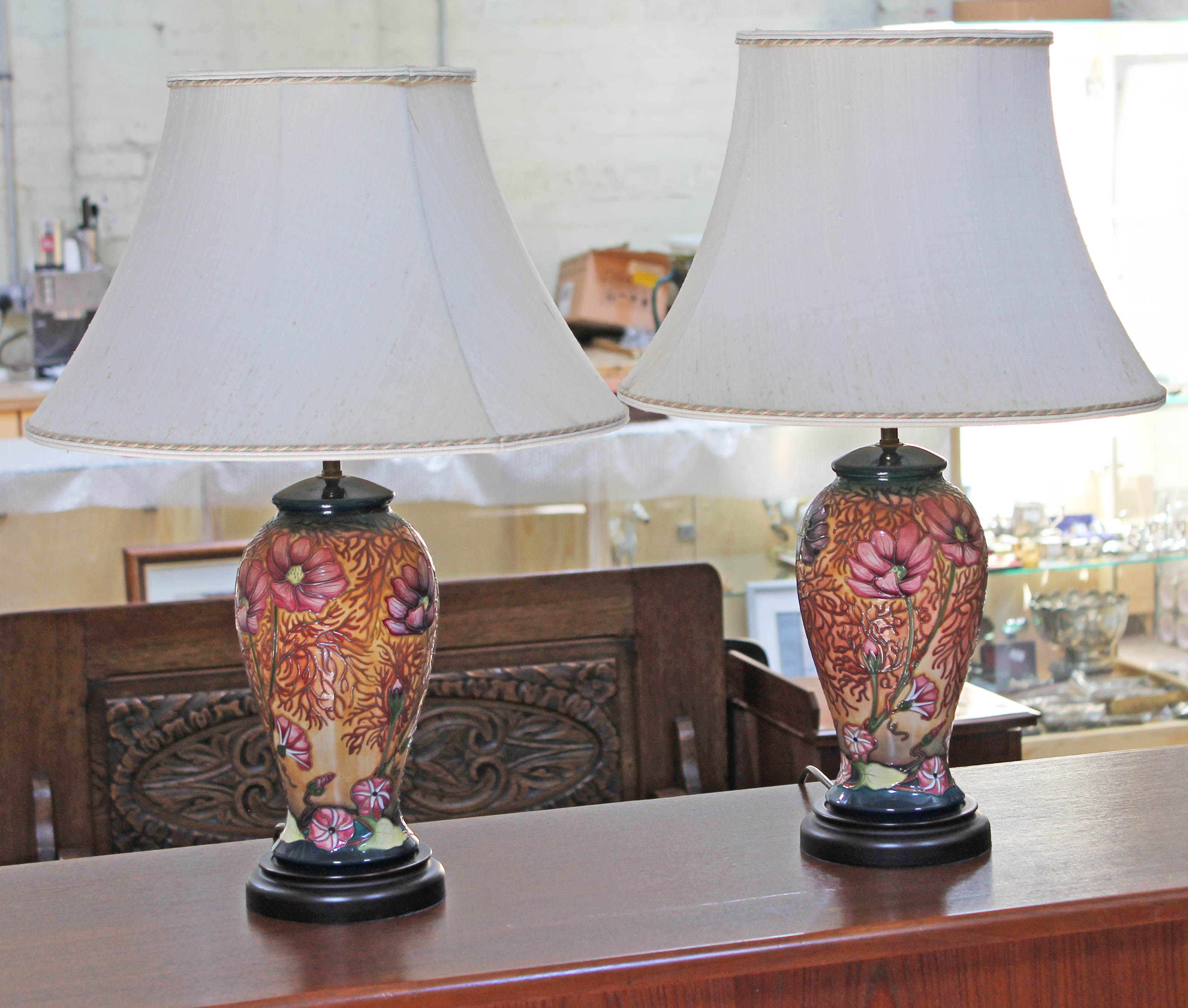 A pair of modern Moorcroft Cosmos pattern pottery table lamps with tube lined floral decoration, - Image 2 of 2