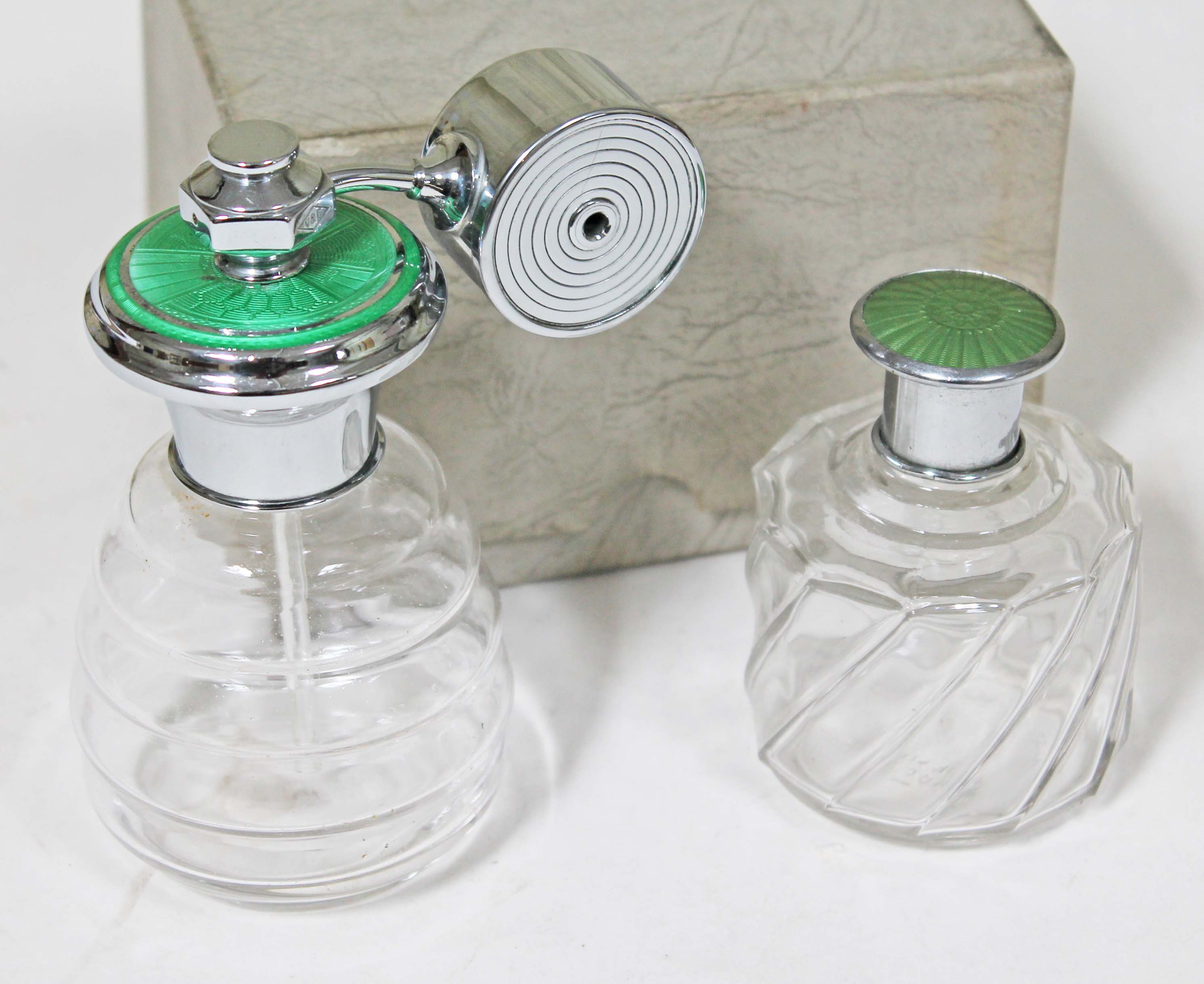 A 1930s Art Deco vintage glass and green enamelled chrome atomiser marked 'V&C', height 12cm, with