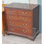 A Georgian mahogany chest of drawers having gilt brass handles and ogee bracket feet, width 90cm,