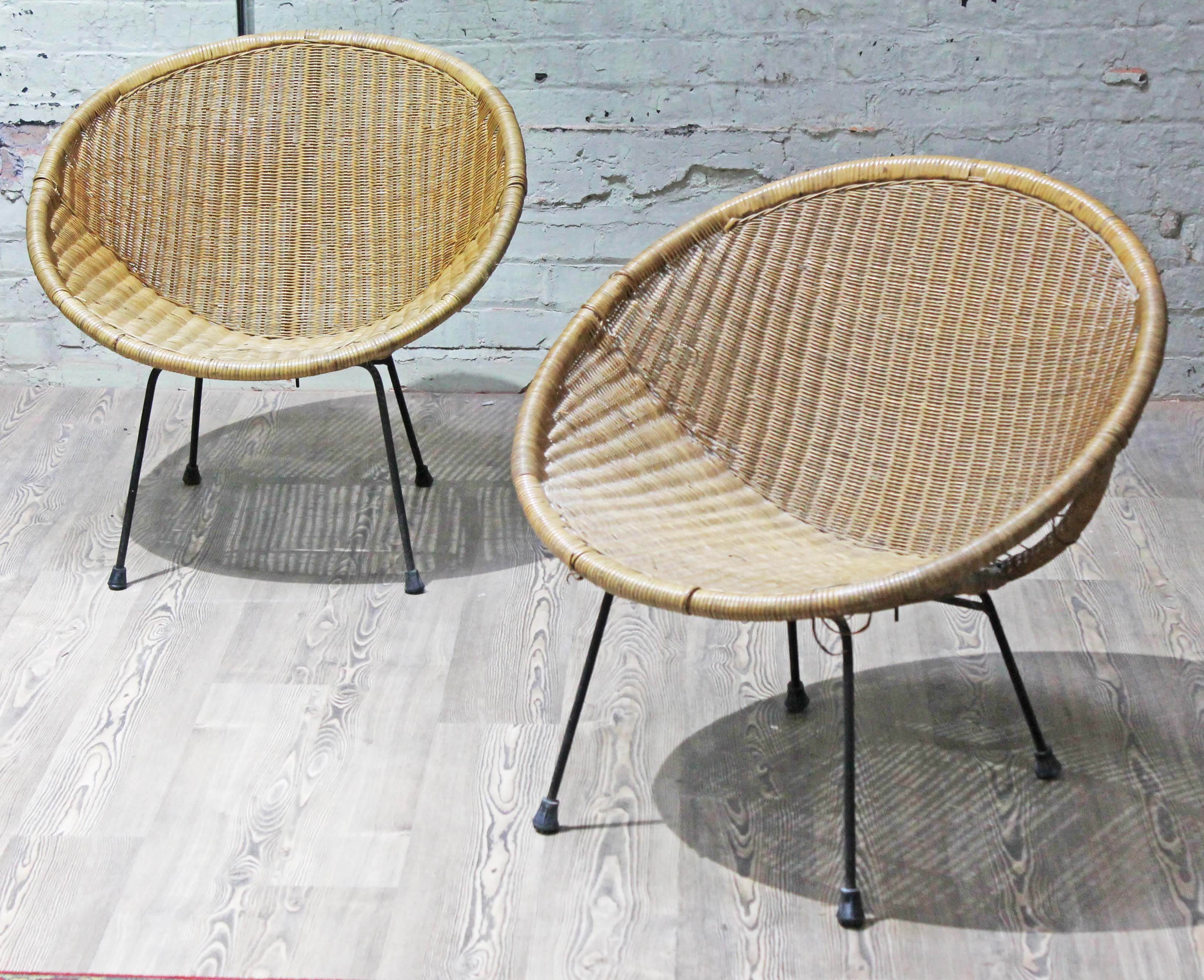 A pair of Franco Albini style retro woven cane chairs.