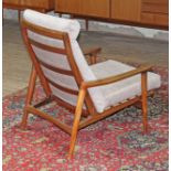 A 1960s Danish style teak lounge chair in the manner of Arne Vodder, width 67cm, depth 86cm & height