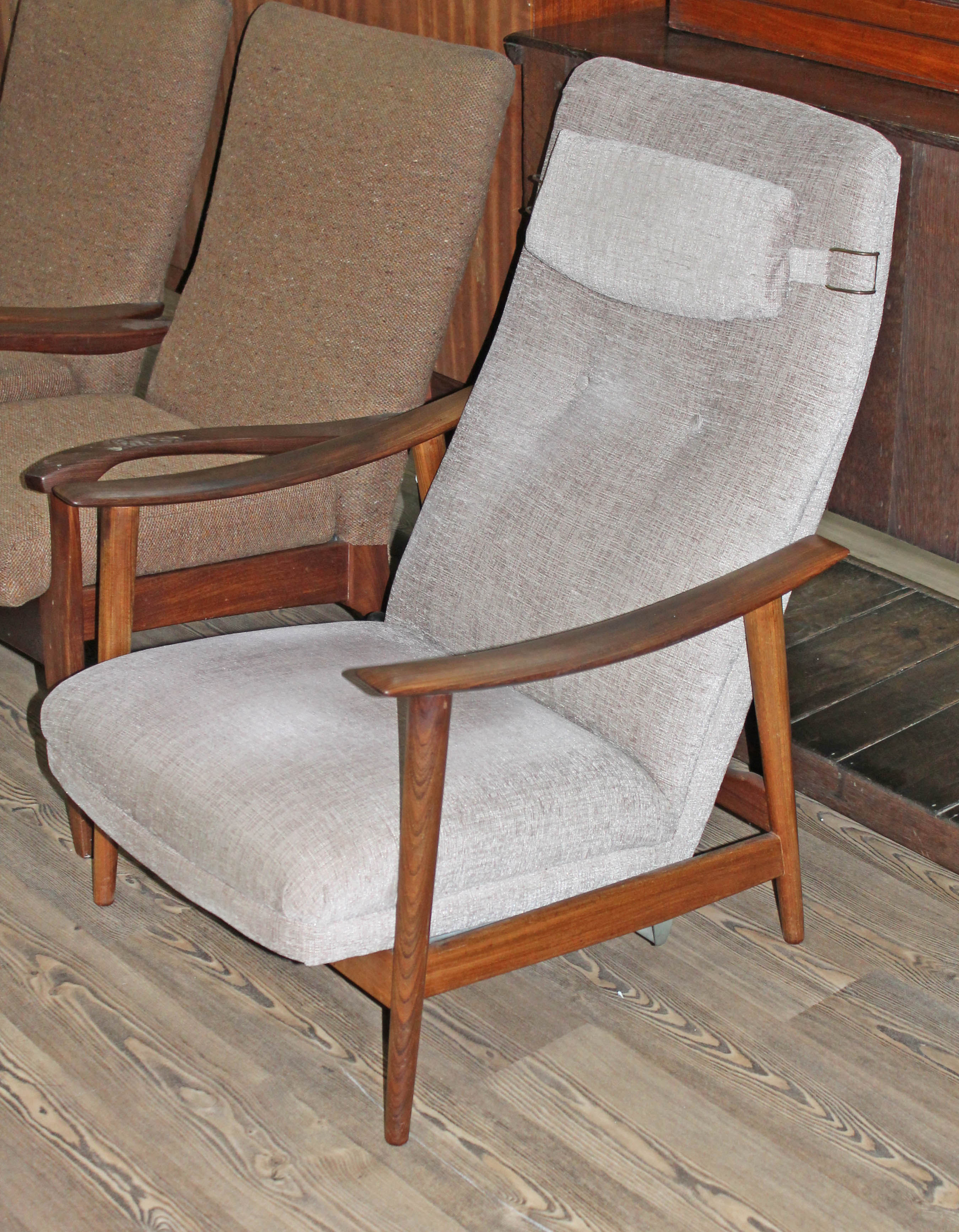 A 1960s Danish style teak reclining lounge chair in the manner of Arne Vodder, width 67.5cm, depth