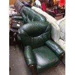 A 2 PIECE GREEN LEATHER AND WOOD SHOW SUITE