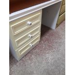 A WHITE DRESSING TABLE