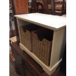 A MODERN UNIT WITH WICKER DRAWERS