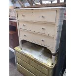 A WHITE PAINTED CHEST OF DRAWERS