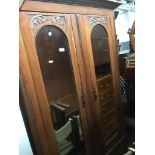 AN EDWARDIAN MIRROR DOOR WARDROBE