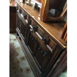 OAK SIDEBOARD WITH LINEN FOLD PANEL DOORS. W138CM