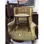 VICTORIAN TURNED LEG BRASS CASTER UPHOLSTERED ARMCHAIR