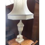 A MARBLE EFFECT TABLE LAMP