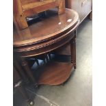 CIRCULAR MAHOGANY NEST OF TABLES. D74CM