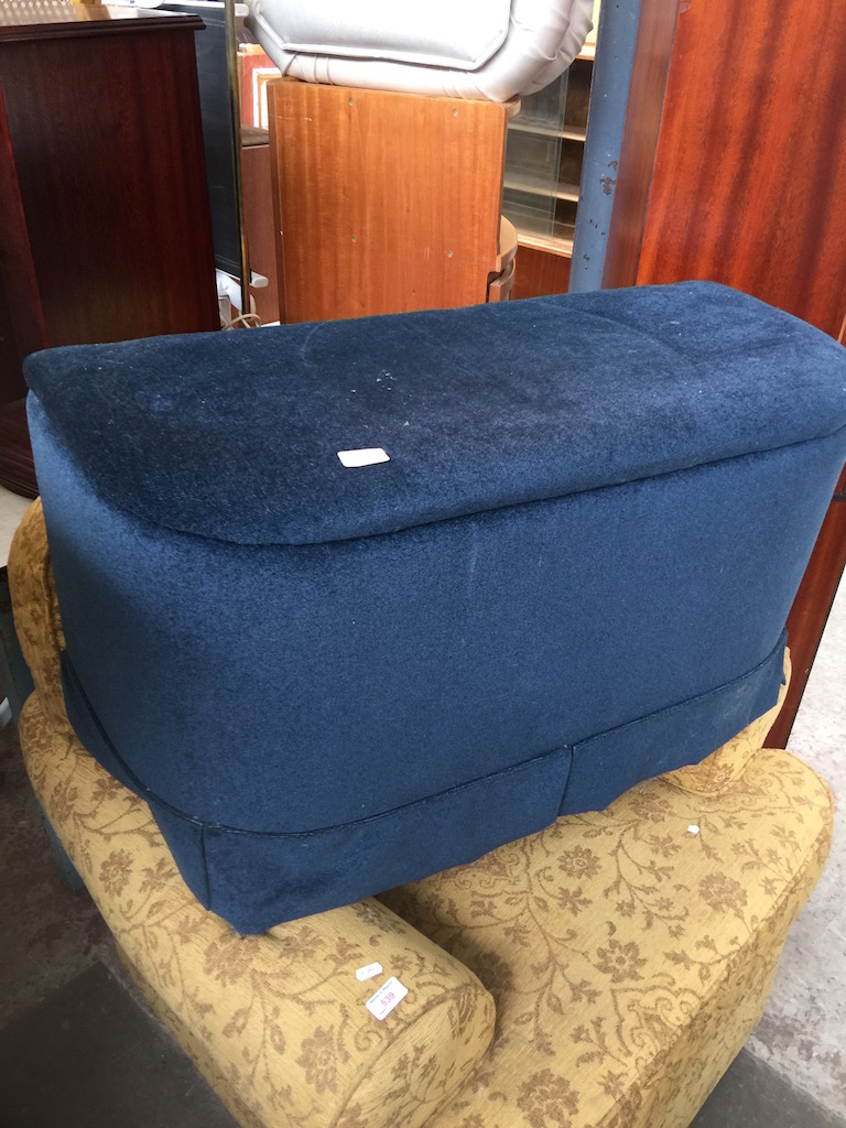 A BLUE UPHOLSTERED BEDDING BOX