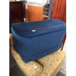 A BLUE UPHOLSTERED BEDDING BOX