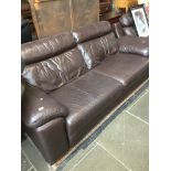 THREE SEATER BROWN LEATHER SETTEE