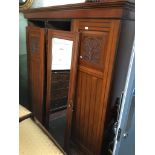 THREE DOOR LATE VICTORIAN WALNUT WARDROBE WITH CARVED PANELS. W197CM