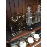 DECANTER STANDS, OTHER METALWARE AND WOODEN SPOONS