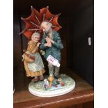 CAPO DI MONTE FIGURE OF AN ELDERLY COUPLE. H27CM