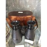 SMALL BINOCULARS IN A LEATHER CASE C