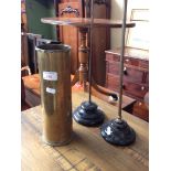 A TRENCH ART SHELL CASE AND TWO DUDLEY & CO (HAT STANDS?).