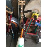 A BUNDLE OF GARDEN TOOLS WITH SPRAYER