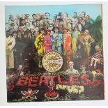 The Beatles - Sgt. Pepper's Lonely Hearts Club Band UK 1967 stereo gatefold LP with poster