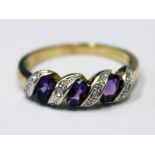 A 9ct gold diamond amethyst baguette ring, gross wt. 2.9g, size P.