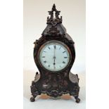 A French boulle and brass inlaid mantel clock, height 30cm, as found.