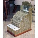 A reproduction National Cash register, height 52cm.