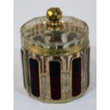 A Venetian overlaid and gilt lidded glass jar by Rialto, sticker to base, height 13cm. Condition -